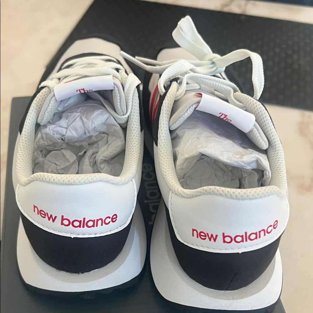 New Balance White and Black Sneakers with Red Accents - Picture 3 of 6